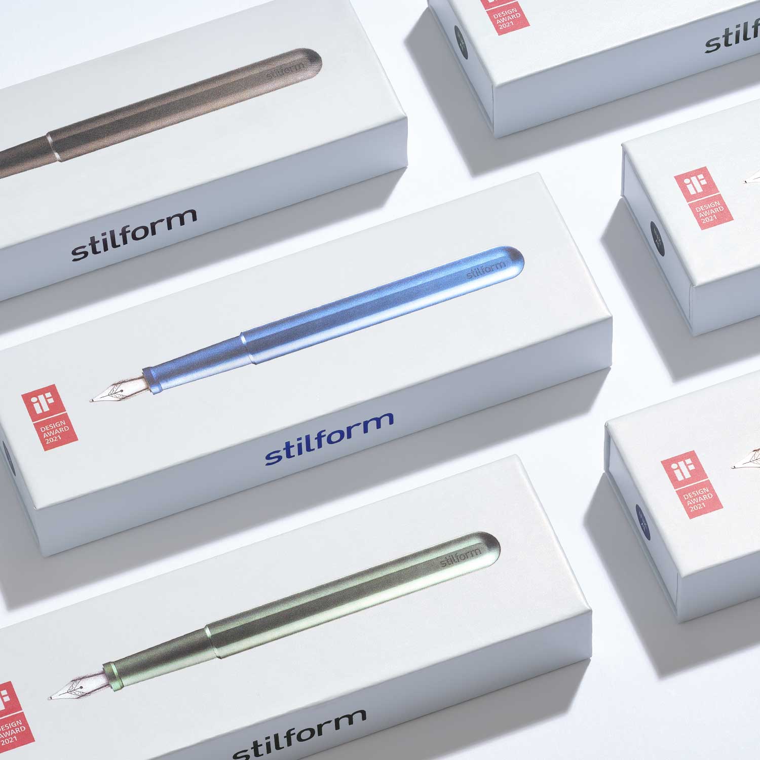 Verpackungen des Aluminium Füllfederhalters mit stilform-Logo und farbiger Produktabbildung auf weißer Schachtel