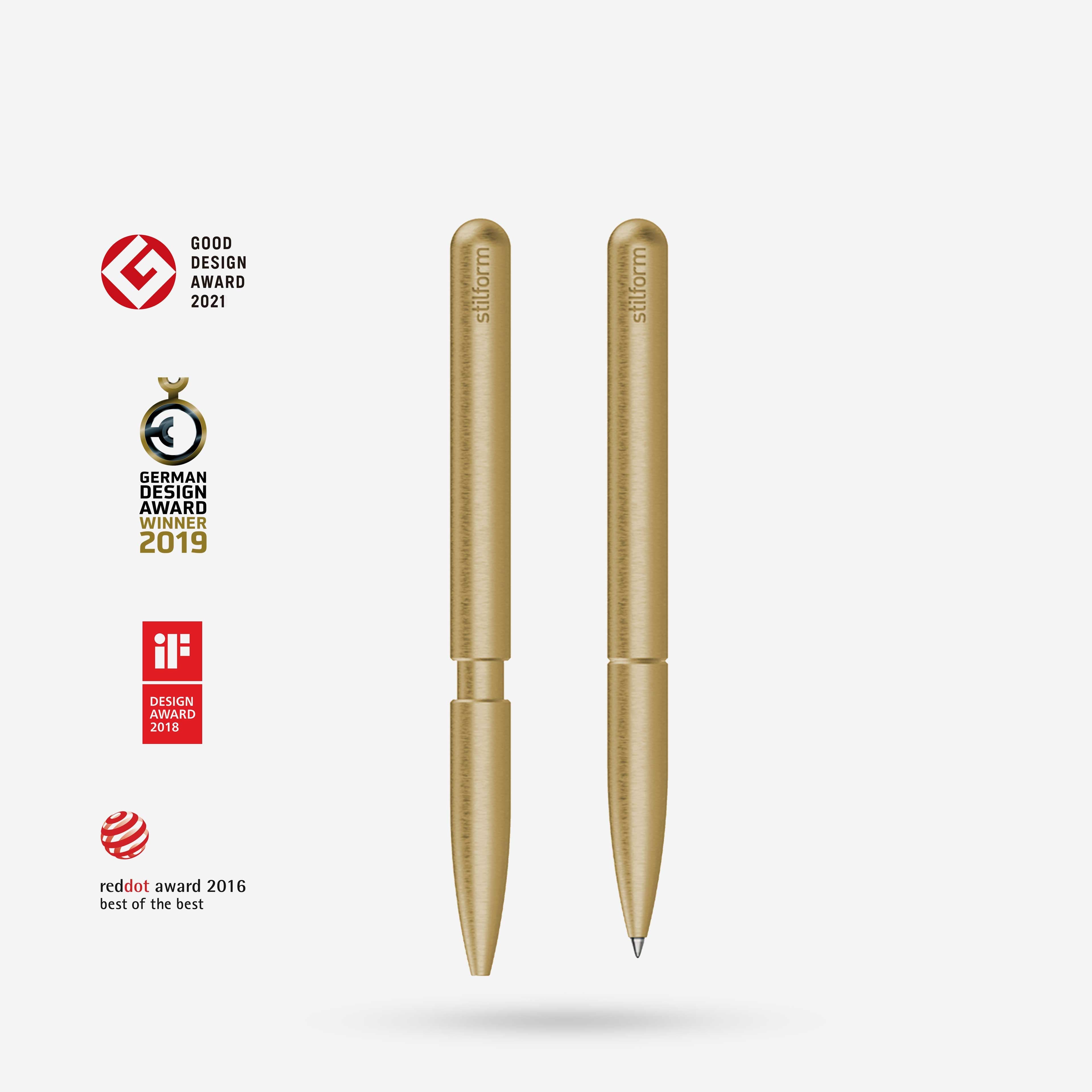 Messing Kugelschreiber Pen, Vorder- und Rückansicht, daneben Design-Auszeichnungen