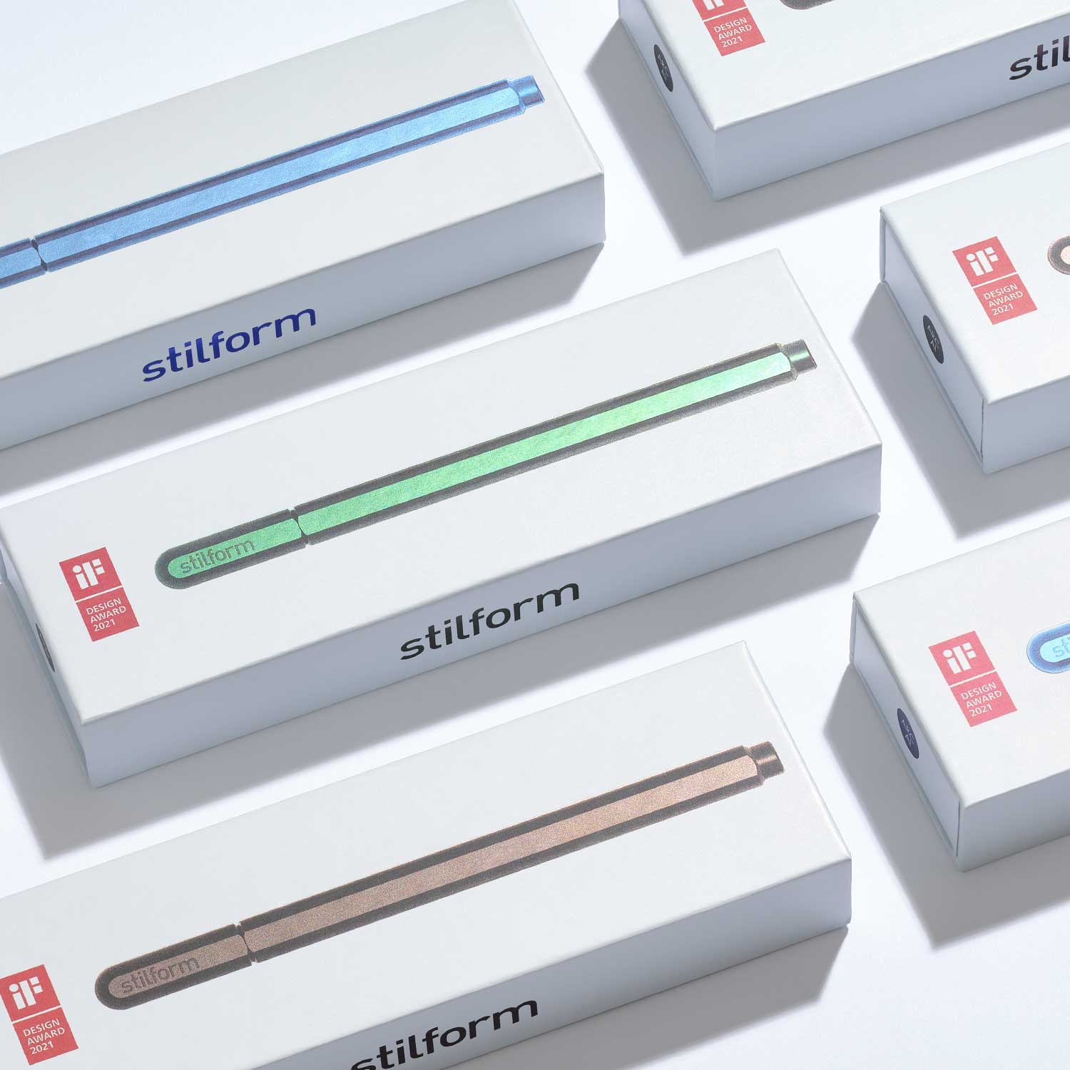 Verpackungen des Aluminium Gelschreiber ARC mit stilform-Logo und farbiger Produktabbildung auf weißer Schachtel